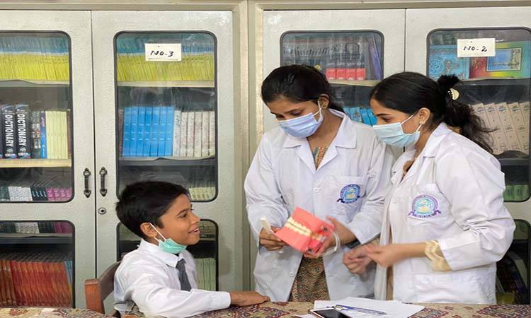 Dow Dental College promotes oral health at Government Boys Secondary School Kotwal Building