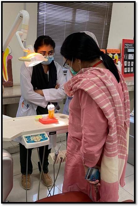 BUMDC students depict dental cavities on models  