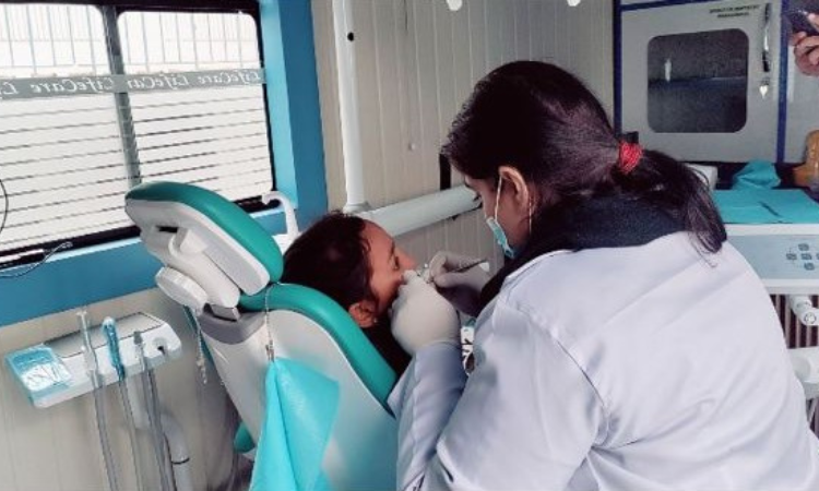   Foundation University conducts dental camp using mobile dental vans