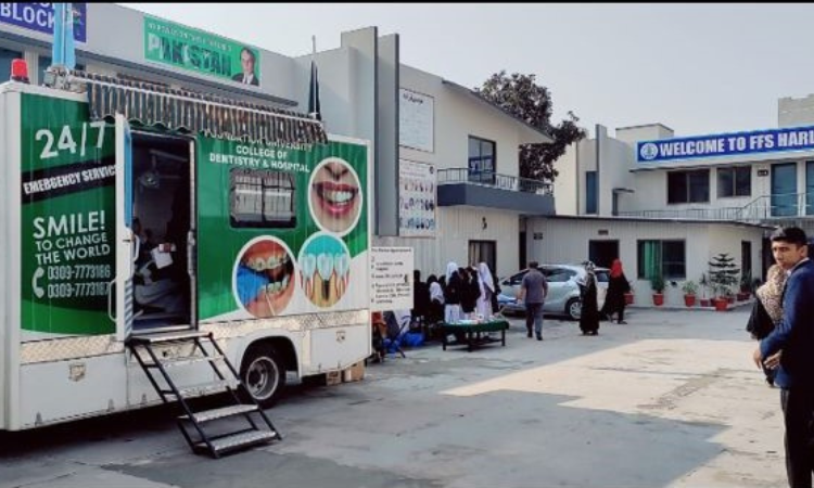   Foundation University conducts dental camp using mobile dental vans