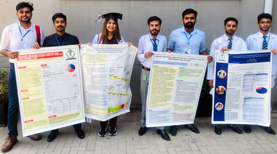 HITEC-IMS teams on victory stand at poster, quiz contests 