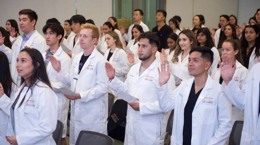 In a first, dentistry students take Dentist-Scientist oath