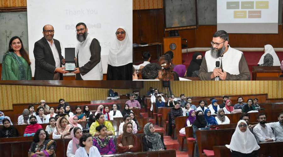 BDS students attending an ethics and professionalism session at JMDC, with Prof. Dr. M. Junaid Lakhani presenting a shield and souvenir to guest speaker Prof. Dr. Muhammad Yahya Noori.