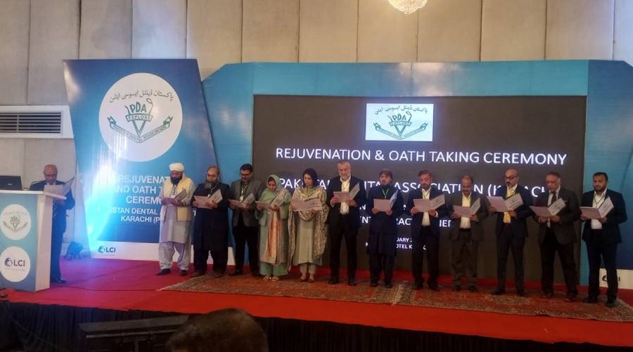 Dr. Khurshid Ahmed officiating the PDA Karachi Chapter’s oath-taking ceremony at Marriott Hotel, Karachi.